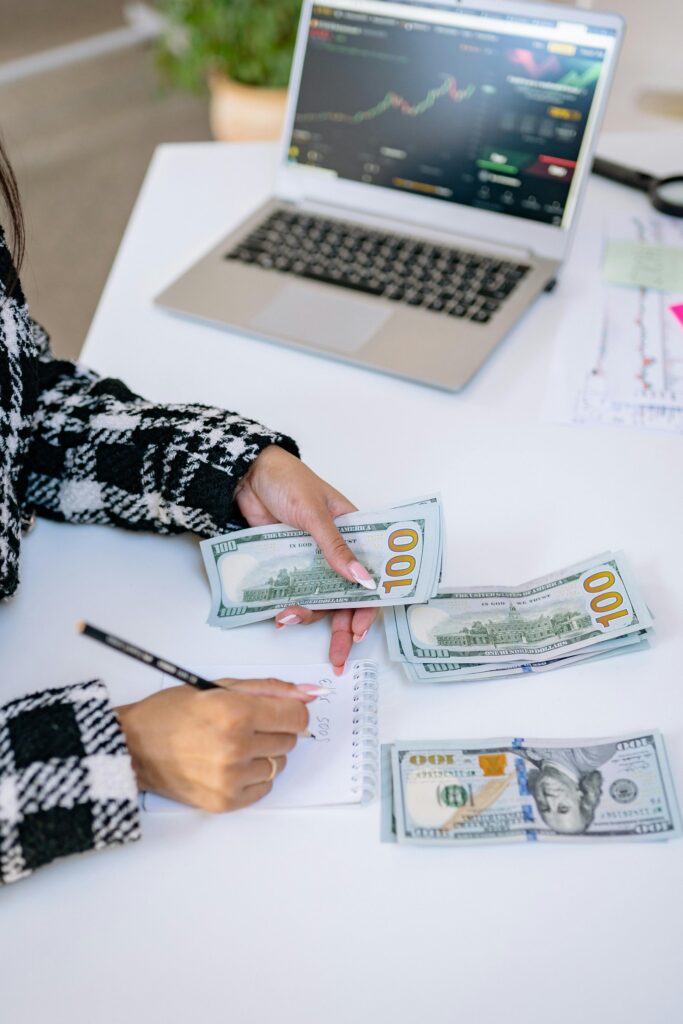 Budget planning and financial management for beginners using laptop and notes