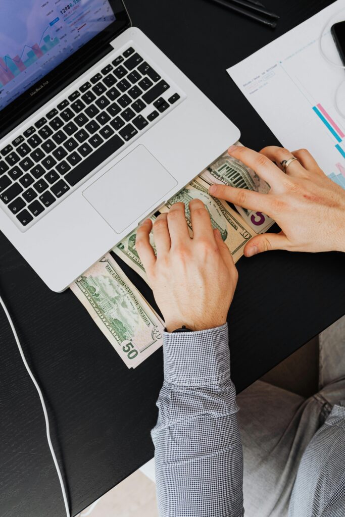 Student earning passive income online using laptop